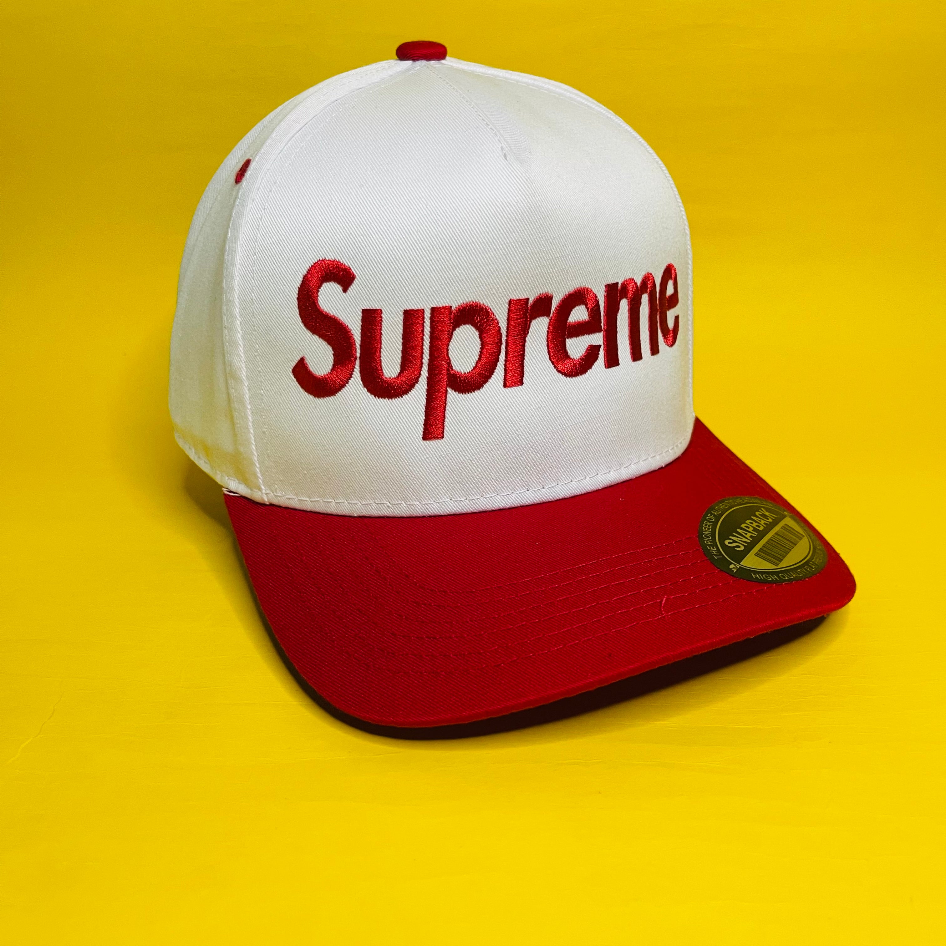 SUPREME CAPS